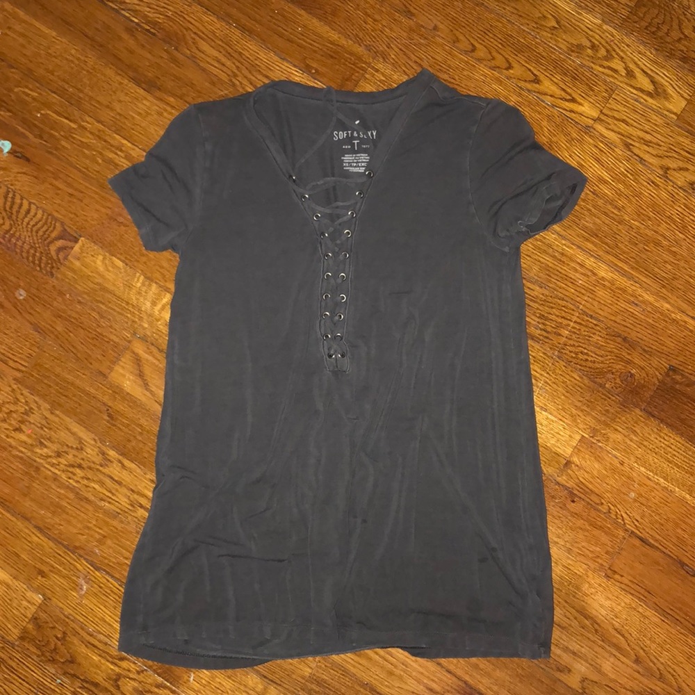 A soft t shirt with crosses down the center